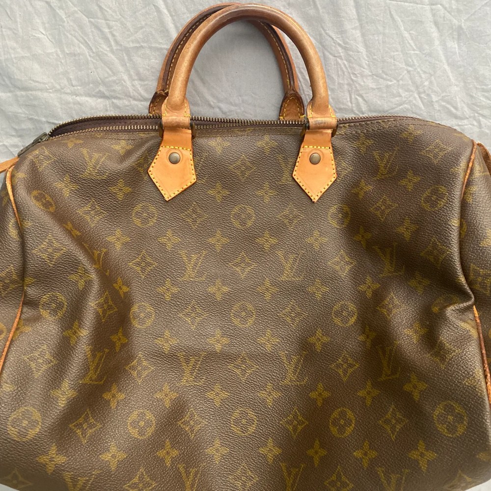 borsa LV shopper riparata da Carucci