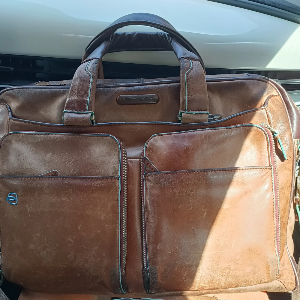borsa da lavoro PiQuadro riparata da Carucci