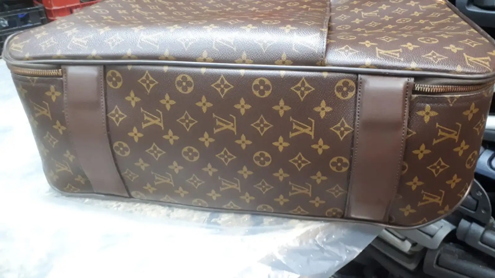 riparazione trolley luis vuitton carucci
