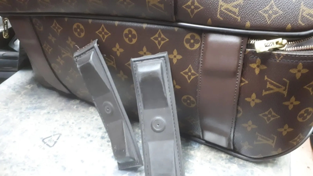 riparazione trolley luis vuitton carucci